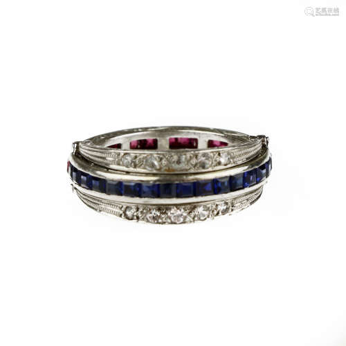 A gem-set and diamond night and day ring