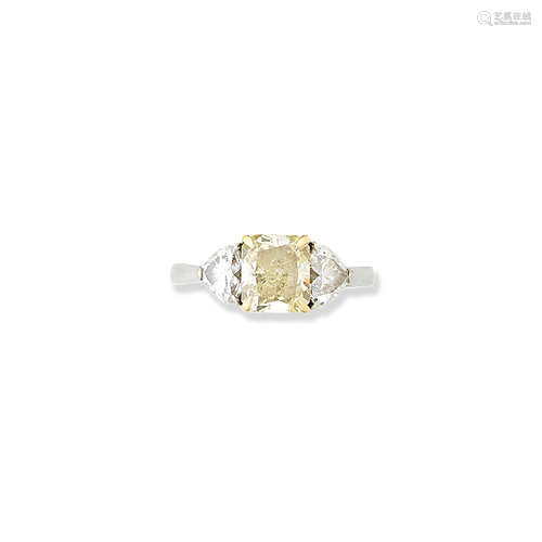 A natural fancy yellow diamond ring