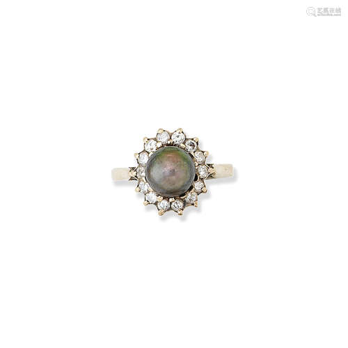 A cultured pearl and diamond cluster ring