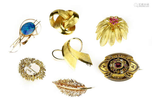 A collection of brooches