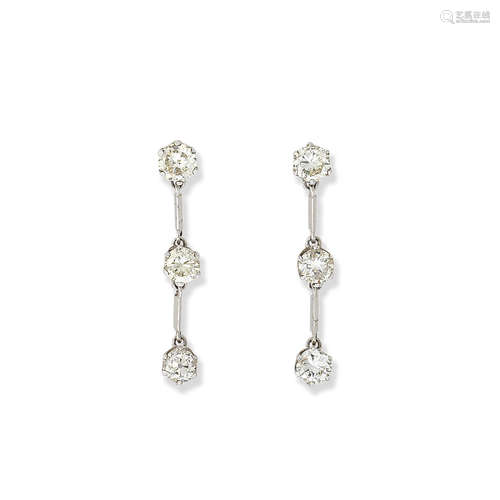 A pair of diamond pendent earrings