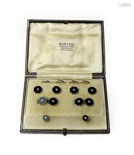 A cased set of onyx and diamond dress studs and cufflinks, cased by Wartski