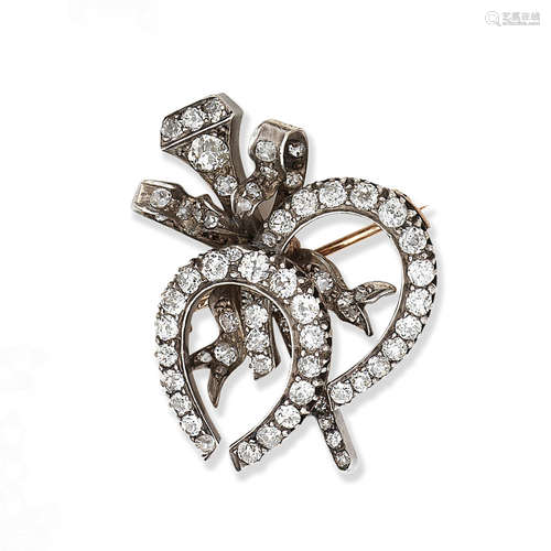 A diamond horseshoe brooch