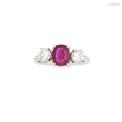 A synthetic ruby and diamond three-stone ring