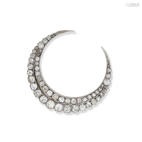 A diamond crescent brooch