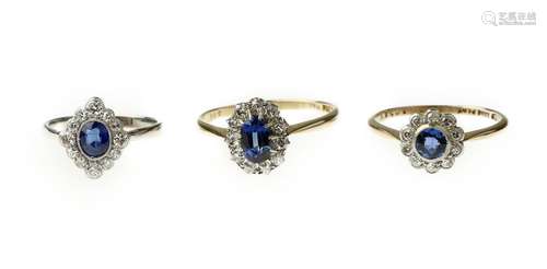 A collection of three sapphire and diamond rings