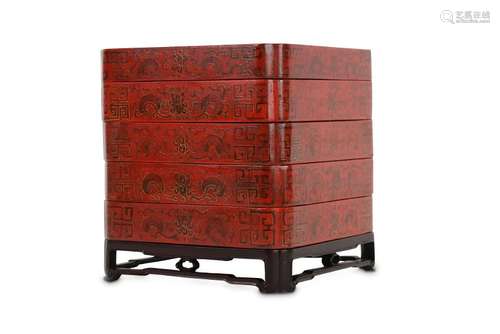 A CHINESE CINNABAR LACQUER FOUR TIER BOX AND COVER.