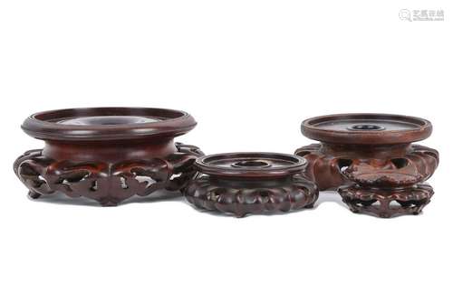 FOUR CHINESE CIRCULAR HONGMU STANDS.