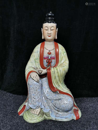 A FAMILLE ROSE GUANYIN SHAPED PORCELAIN ORNAMENT