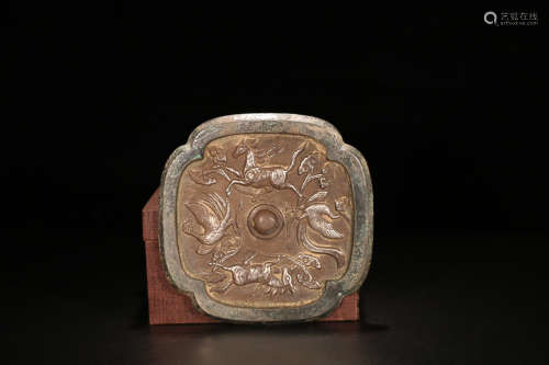 A BRONZE MIRROR EMBEDED WITH SILVER CELESTIAL BEAST PATTERN
