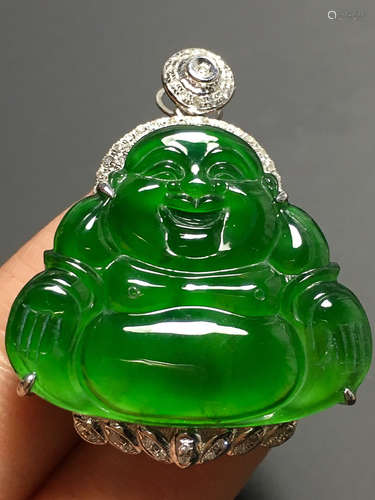 A TRANSLUCENT JADEITE ZHENGYANG GREEN BUDDHA PENDANT