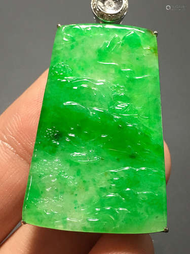 A TRANSLUCENT JADEITE ZHENGYANG GREEN MOUNTAIN PENDANT