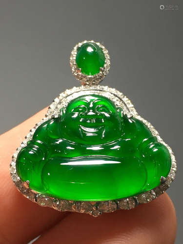 A TRANSLUCENT JADEITE ZHENGYANG GREEN BUDDHA PENDANT