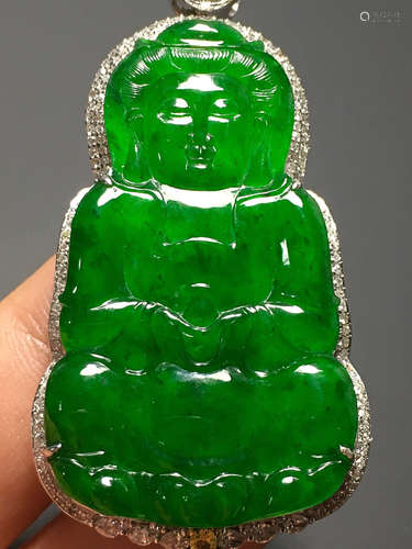 A TRANSLUCENT JADEITE ZHENGYANG GREEN BUDDHA PENDANT