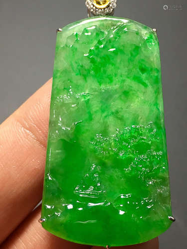 A TRANSLUCENT JADEITE ZHENGYANG GREEN MOUNTAIN PENDANT