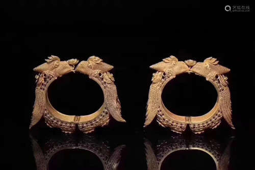 17-19TH CENTURY, A PAIR OF PHOENIX PATTERN GILT SILVER BRACELET, QING DYNASTY