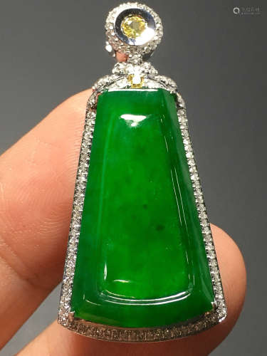 A TRANSLUCENT JADEITE ZHENGYANG GREEN AUSPICIOUS TABLET PENDANT