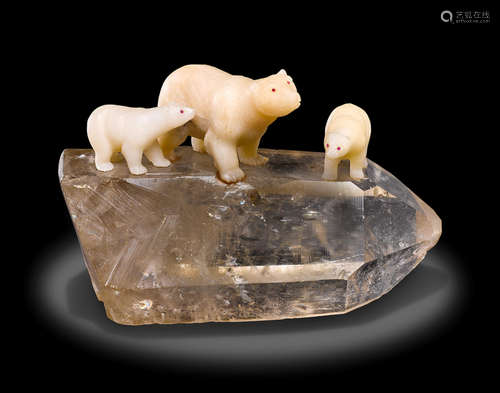 Three White Chalcedony Bears on a Quartz Crystal