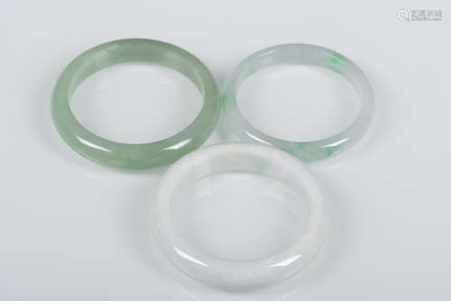 THREE JADEITE BANGLES WITH CERTIFICATE