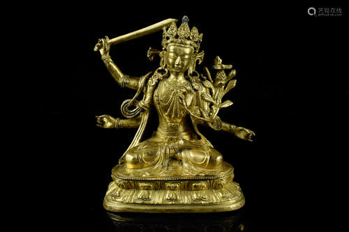 GILT BRONZE CAST MANJUSHRI SEATED FIGURE