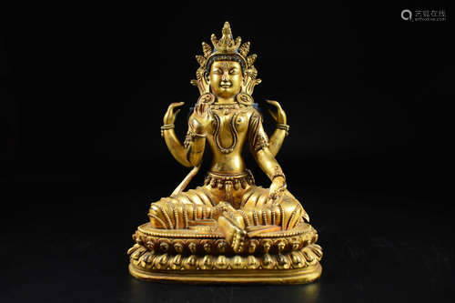 GILT BRONZE CAST FOUR-ARM AVALOKITESHVARA SEATED FIGURE