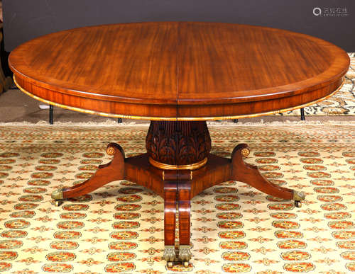 Regency style mahogany, rosewood, and satinwood split pedestal dining table, the cross-banded oval