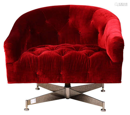 Ward Bennett tufted swivel lounge chair, upholstered in crimson velvet, and rising on a steel swivel