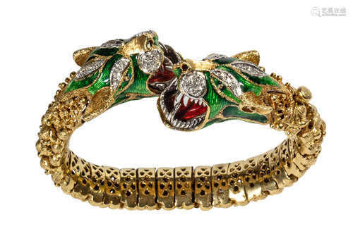 Diamond, enamel and 18k yellow gold panther bracelet Designed as two opposing panther heads,