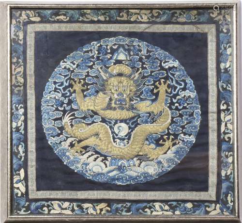 Chinese silk embroidery, featuring a gilt couched frontal facing dragon amid blue cloud roundel