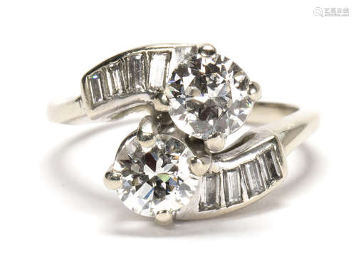 Diamond and 14k white gold by-pass ring Featuring (1) old European-cut diamond, weighing