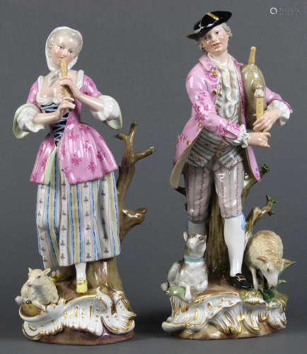 (lot of 2) Meissen porcelain figural groups, each playing an instrument, dressed in period attire