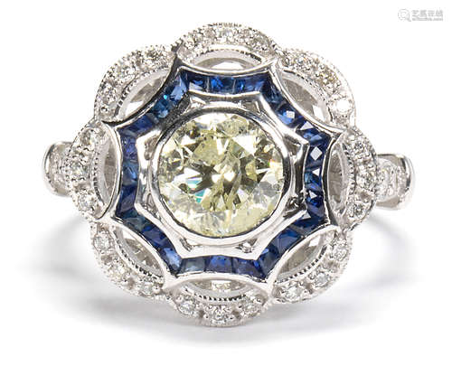 Diamond, sapphire and platinum ring Centering (1) round brilliant-cut diamond, weighing