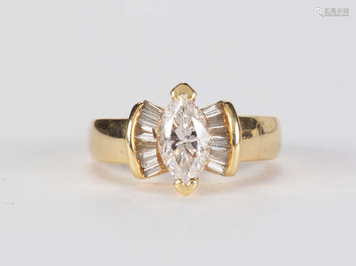 Diamond and 14k yellow gold ring Featuring (1) marquise-cut diamond, weighing approximately 1.15