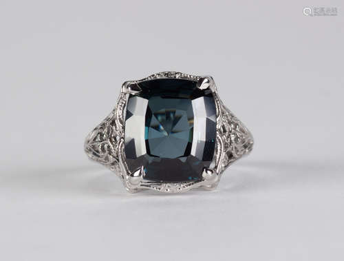 Spinel and 14k white gold ring Featuring (1) cushion-cut spinel, weighing 7.40 cts., accompanied