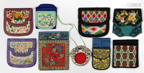 (lot of 8) Chinese assorted wallets, consisting of four with a flap on either side; four of tri-fold