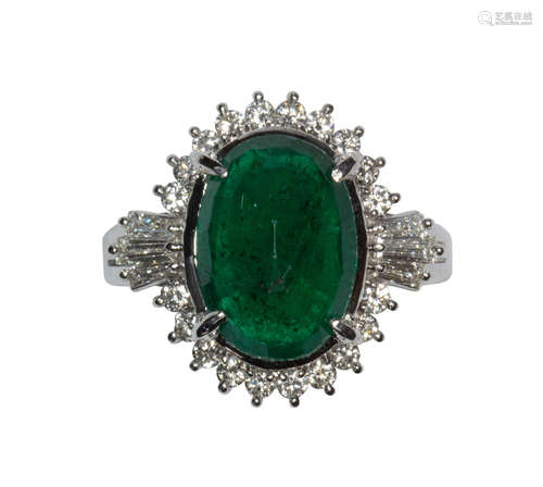 Emerald, diamond and platinum ring Centering (1) oval-cut emerald, weighing 4.58 cts., accompanied