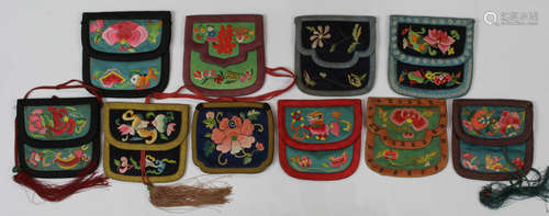 (lot of 10) Group of Chinese embroidered wallets, mostly of blue or green hues, with one flap on