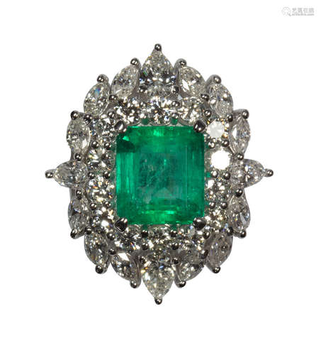 Emerald, diamond and 18k white gold ring Centering (1) emerald-cut emerald, weighing 4.76 cts.,