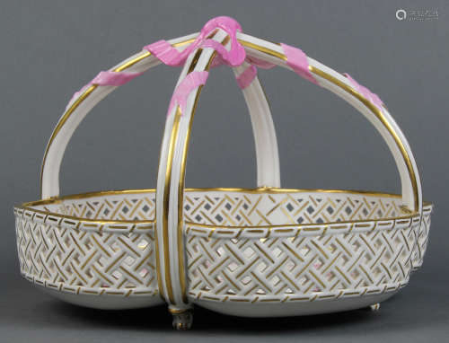 KPM porcelain basket, the handled form having hand painted floral reserves, verso with KPM