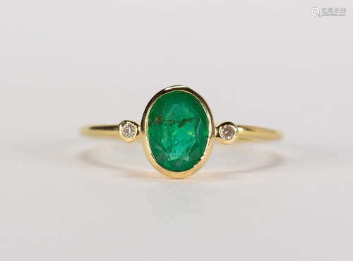 Emerald, diamond and 18k yellow gold ring Centering (1) oval-cut emerald, weighing approximately 0.