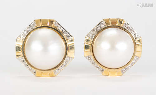 Pair of mabe cultured pearl, diamond and 14k yellow gold earrings Centering (2) mabe cultured