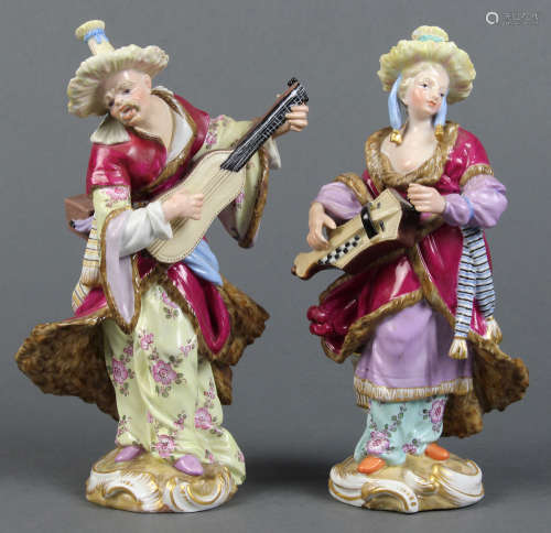 (lot of 2) Meissen porcelain Orientalist figural groups, each playing a stringed instrument and