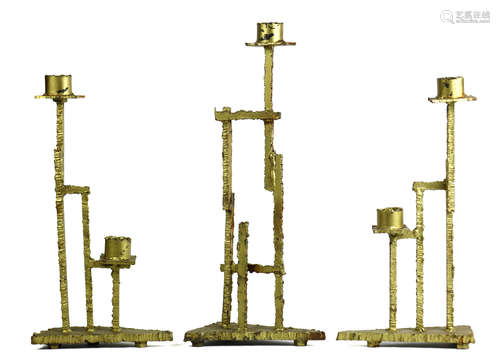 (lot of 3) Brutalist sculptural candelabras, two having two lights, the other one, and rising on a