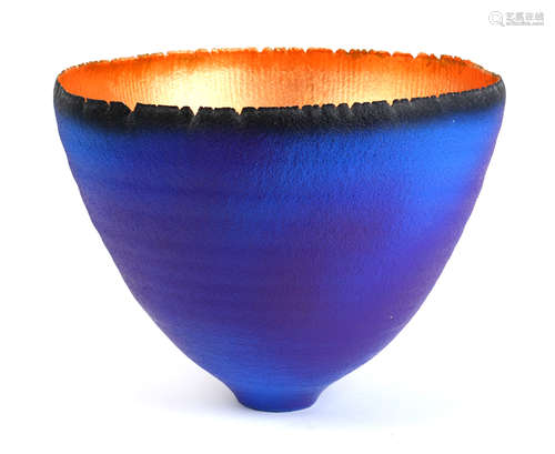 Hand thrown ceramic sculpture, having an iridescent interior, the exterior executed in blue to