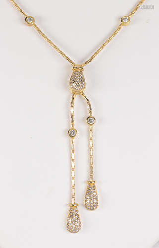 Diamond and 14k yellow gold convertible pendant necklace Featuring (87) full-cut diamonds,