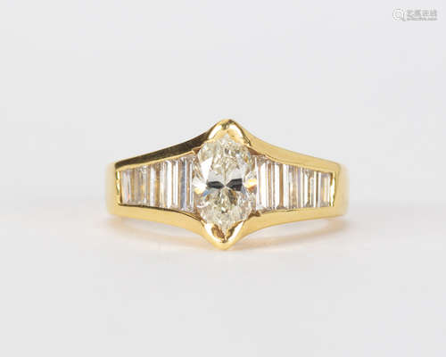 Diamond and 18k yellow gold ring Centering (1) marquise-cut diamond, weighing approximately 1.20