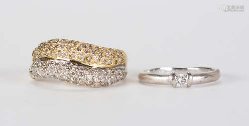 (Lot of 2) Diamond and gold rings Including 1) ring, featuring (40) full-cut diamonds, weighing a