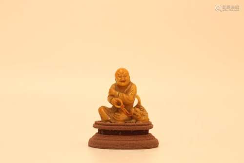 A CARVED SOAPSTONE LUOHAN.ANTIQUE