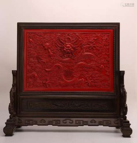 A CINNABAR LACQUER 'DRAGON' TABLE SCREEN.QING DYNASTY