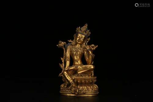 A GILT-BRONZE FIGURE OF GUANYIN.MING DYNASTY